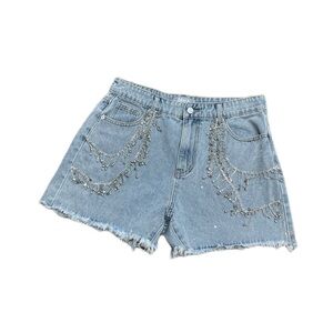 Buckle Blue. Never worn. Size L Jean shorts with intact rhinestones.